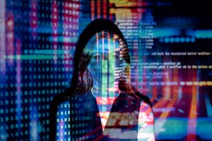 A woman with digital code projections on her face, representing technology and future concepts. A woman with digital code projections on her face, representing technology and future concepts.