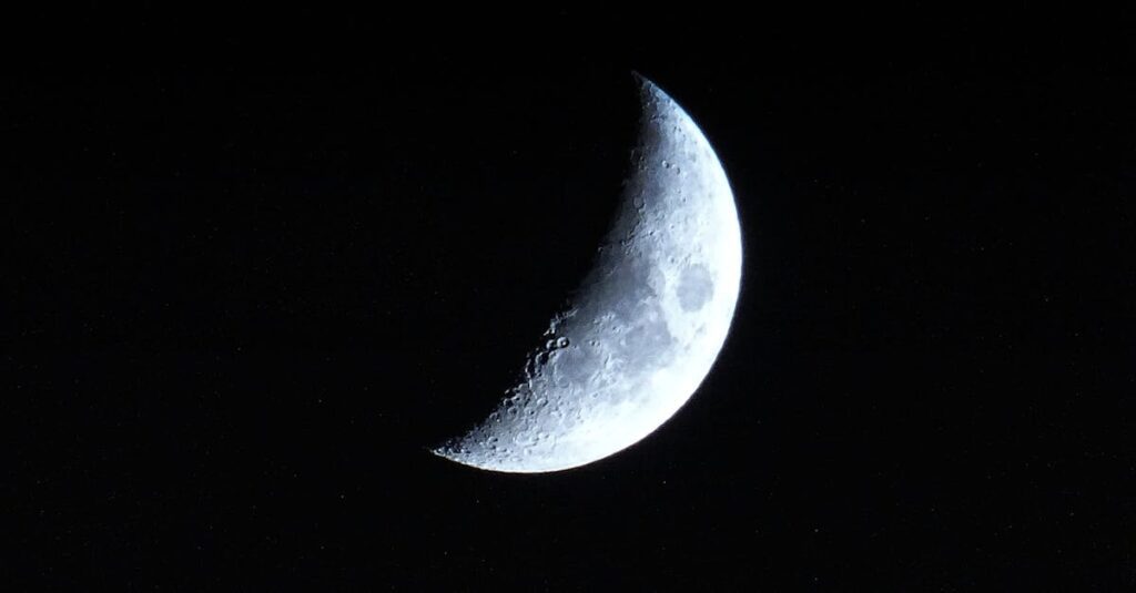 pexels-photo-399973-399973 A detailed view of the crescent moon against a dark night sky, showcasing lunar craters.